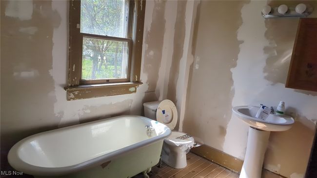 Bathroom featuring a freestanding tub | Image 11