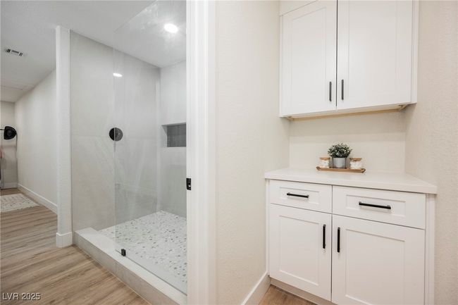 Separate toilet room with storage | Image 33