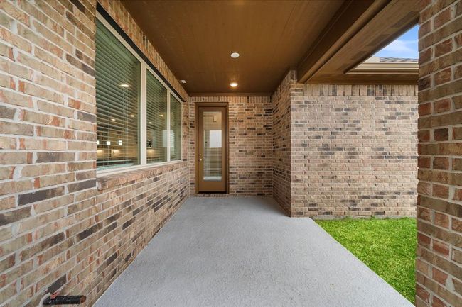 Backyard covered patio. | Image 30