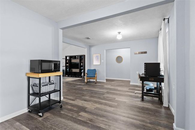 View of Den and a Partial view of what you will see is a Great-Sized Living Room | Image 13