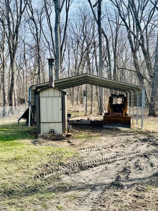 Auxiliary heat source and carport | Image 25
