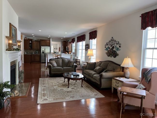 Living room with dark hardwood / wood-style floors | Image 26