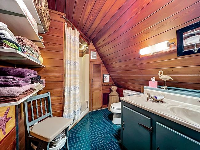 Primary bath has shelving | Image 28