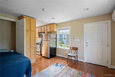 Bedroom featuring a 2019 Mini split HVAC unit, light hardwood flooring | Image 2