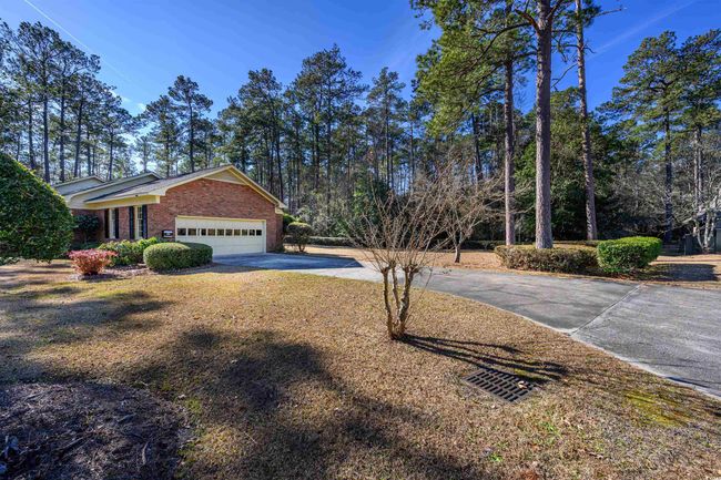 View of front of property featuring a garage | Image 5