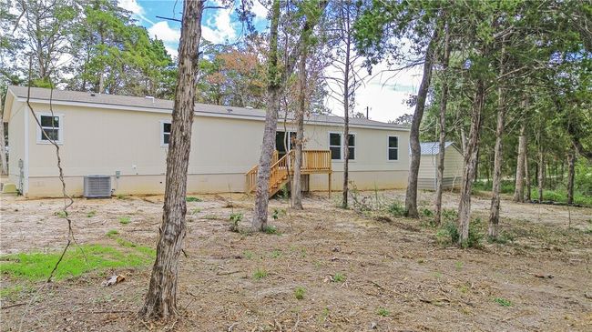 Back of house featuring central air condition unit | Image 4