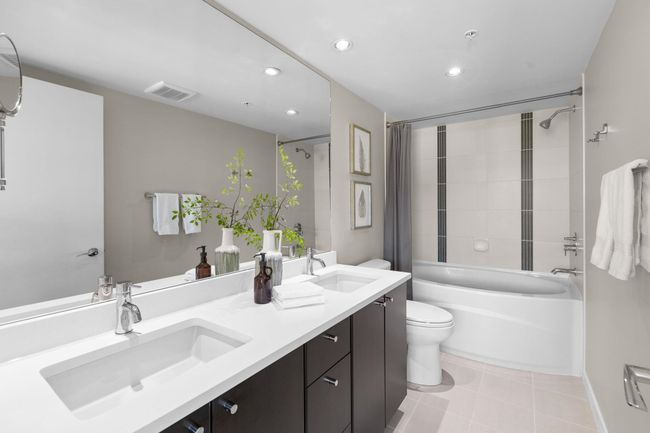 Full bath with toilet, tile patterned floors, a sink, and recessed lighting | Image 13