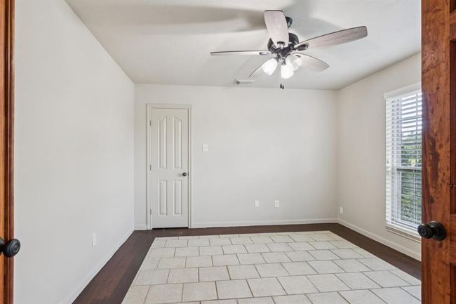 Another view of the the first floor bedroom. | Image 9