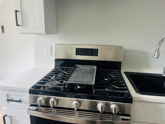 Kitchen has gas stove/range | Image 5