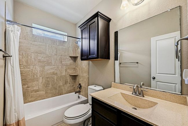 Bathroom with shower / tub combo and vanity | Image 33