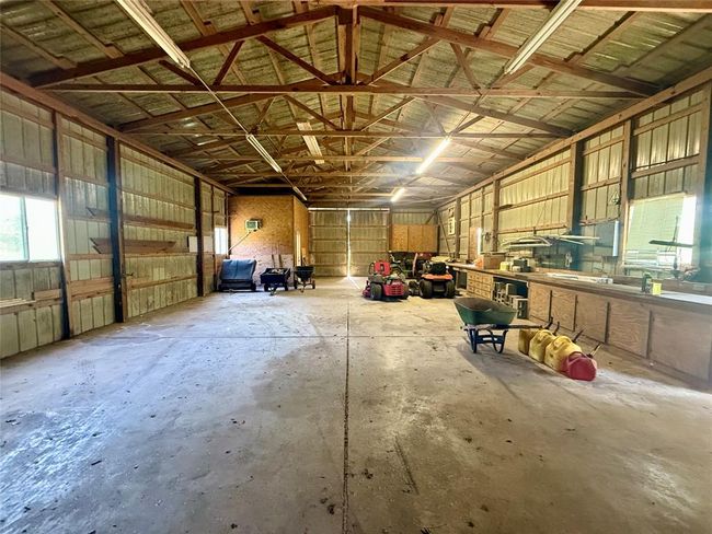 Built in counters and storage in barn/shop | Image 30