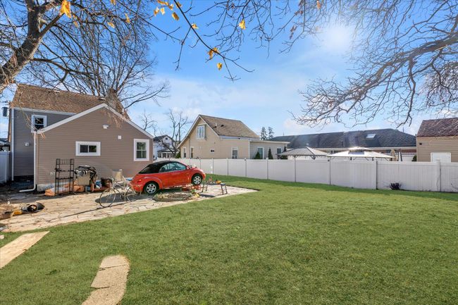 View of yard with a patio area | Image 16