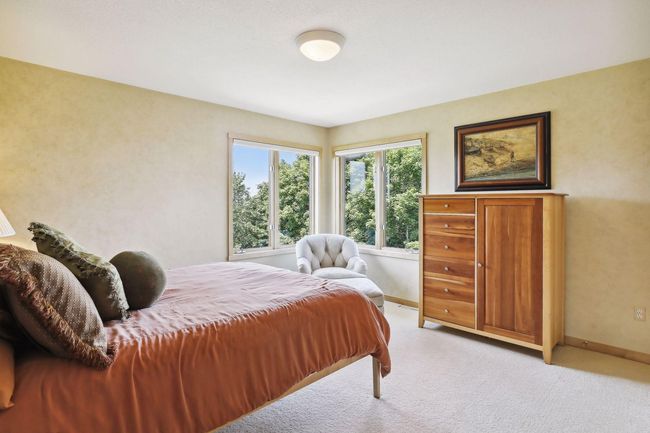 No shortage of space with 4 bedrooms on the UPPER LEVEL!! 4th bedroom offers wonderful corner windows that make this space feel open and spacious. | Image 31