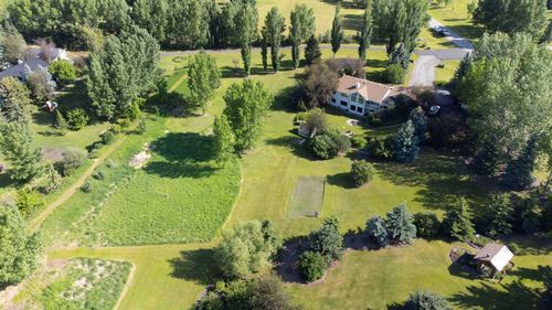 80057 Highwood Meadows Dr E, Foothills, AB, T1S4Y9 | Card Image