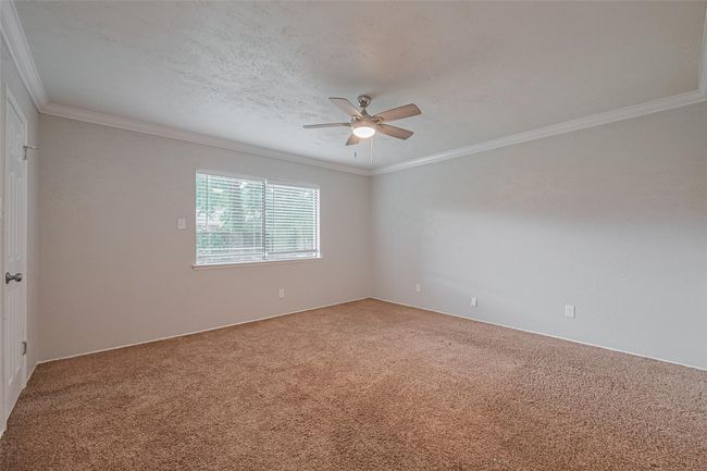 Welcome to your spacious primary bedroom! | Image 14