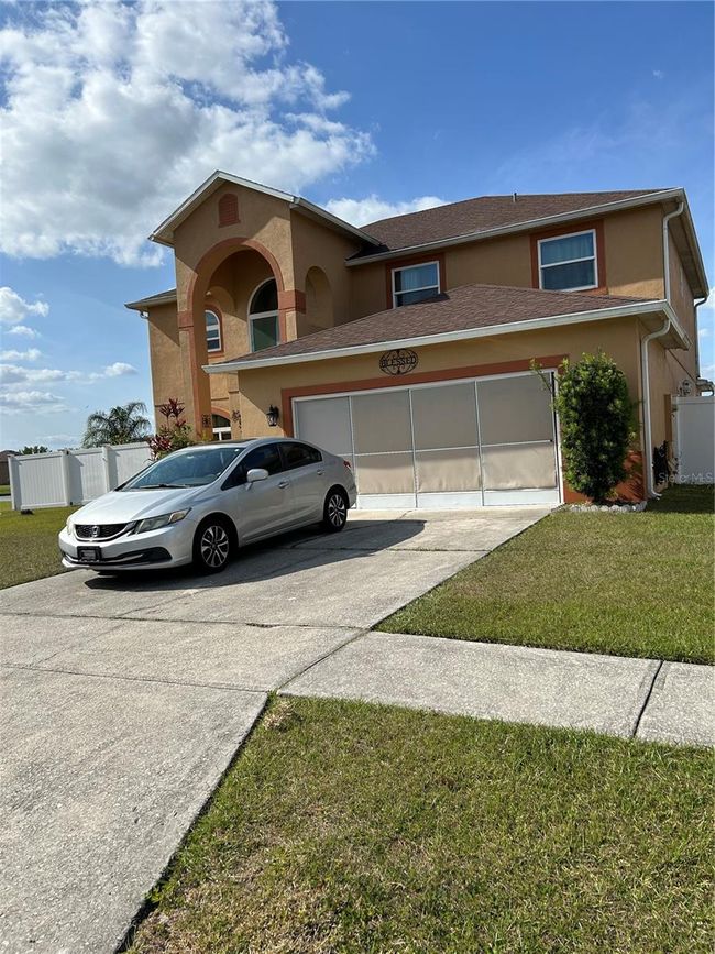 5406 Crepe Myrtle Cir, House other with 4 bedrooms, 3 bathrooms and null parking in KISSIMMEE FL | Image 35