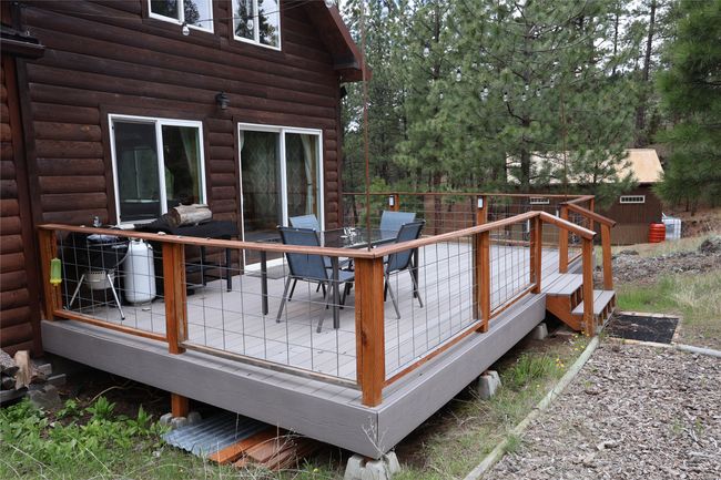 Wooden deck with outdoor dining space | Image 23