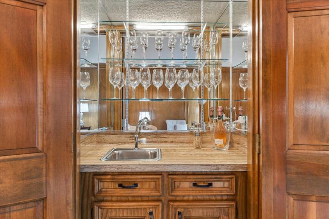 Enjoy entertaining at its best with this handsome wet bar. | Image 6