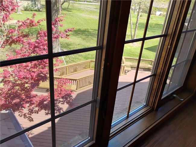 Upstairs game room view of backyard deck | Image 73