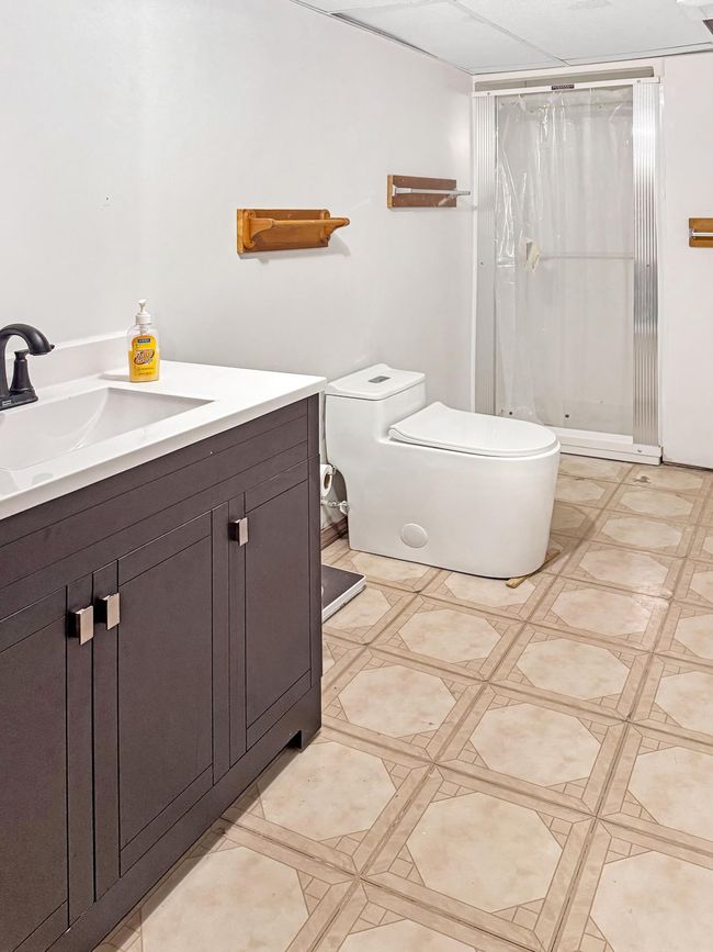 Head on down tot he basement for this 3/4 bathroom | Image 22