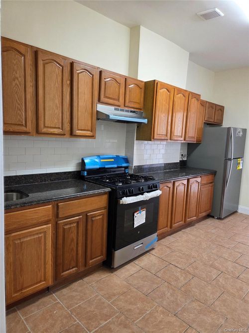 9902 43rd Ave, Corona, NY, 11368-2438 | Card Image