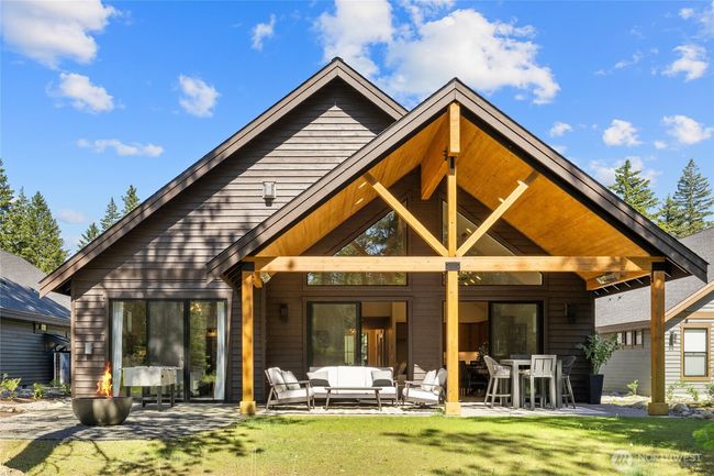 This beautiful covered back patio adds 313 additional square footage with gas firepit. | Image 21