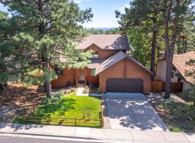 Beautiful Fully Remodeled home enveloped in gorgeous Ponderosa Pines | Image 3