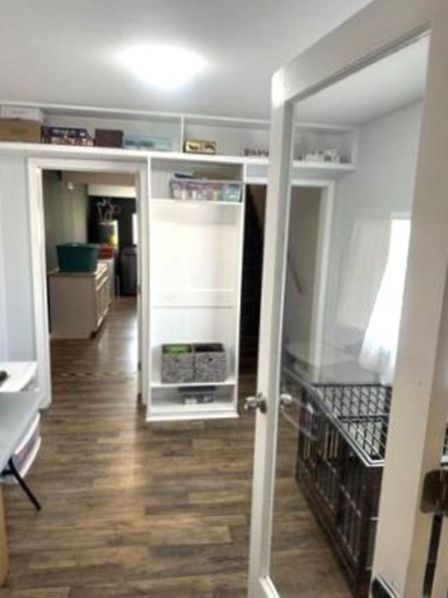 Hall with wood finished floors | Image 22