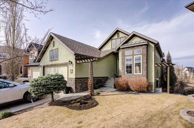 22 Tuscany Estates Crescent Nw, Home with 3 bedrooms, 2 bathrooms and 4 parking in Calgary AB | Image 1