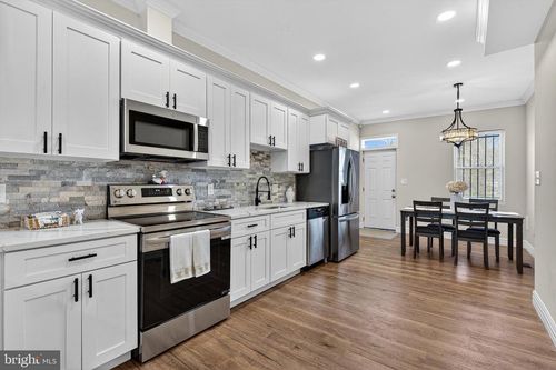 1762 E North Ave, BALTIMORE, MD, 21213-1424 | Card Image