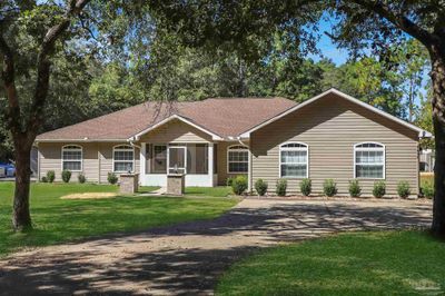 4454 Lyons Pl, House other with 3 bedrooms, 2 bathrooms and 3 parking in Holt FL | Image 2