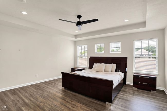 primary bedroom at far end of the upstairs providing a split floorplan of bedrooms | Image 13