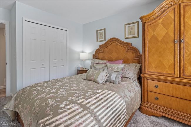 Bedroom featuring a closet and carpet flooring | Image 20