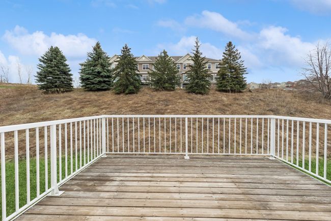 Treed & hillside views off of this 12X10 Deck. | Image 28