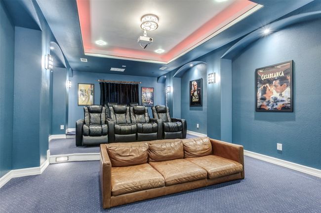 What a wonder place to cozy-up! Enjoy the red-lit trey ceiling and sublime illumination of the room. | Image 27
