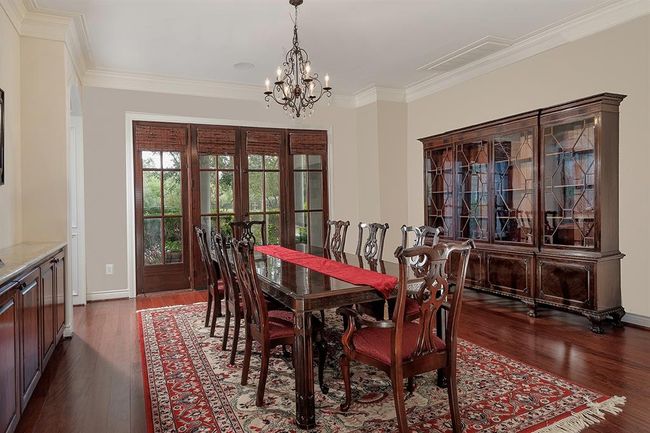 As you enter, the formal dining is to your left, and can accommodate many guests | Image 7