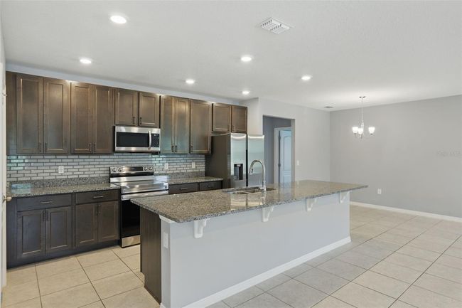 15250 Aquarius Way, House other with 3 bedrooms, 2 bathrooms and null parking in MASCOTTE FL | Image 10