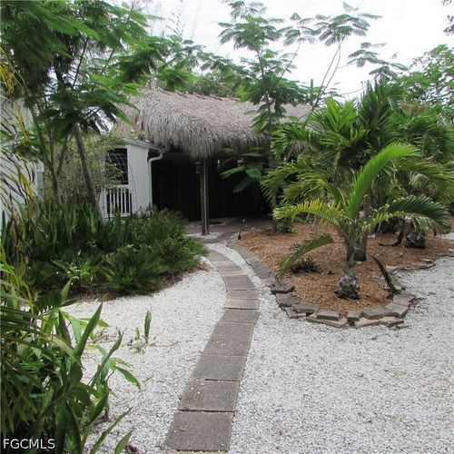 7697 Beach Daisy Ln, BOKEELIA, FL, 33922-1921 | Card Image