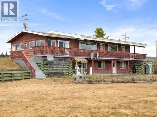 6 Nisutlin Dr, House with 4 bedrooms, 3 bathrooms and null parking in Teslin YT | Card Image