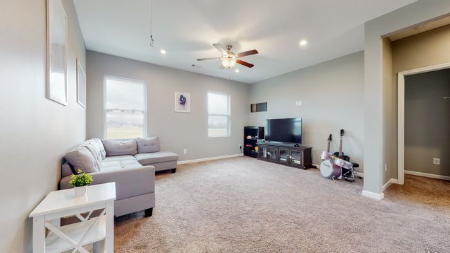 Loft with natural light and view of back field | Image 24