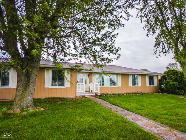 single story home featuring a front lawn | Image 21