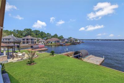 2nd View of lake Conroe from upstairs primary bedroom balcony. | Image 3