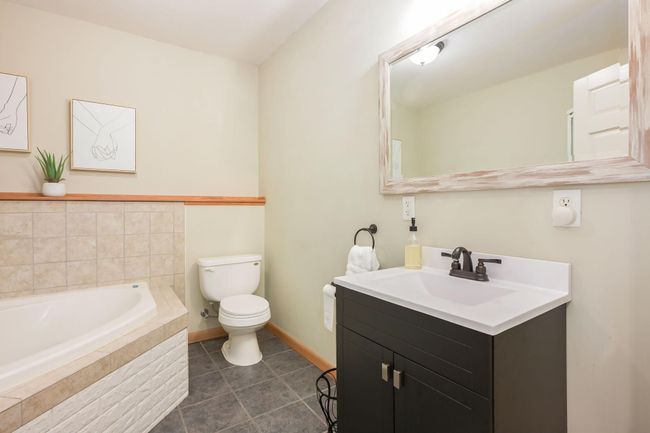 Lower level bathroom is clean and neutral. | Image 37
