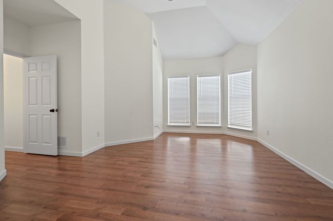 Primary bedroom is located at the back of the home for maximum privacy | Image 12