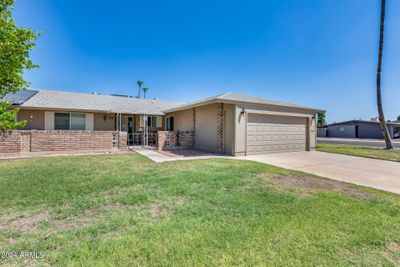 10702 W Kelso Drive, Home with 2 bedrooms, 2 bathrooms and null parking in Sun City AZ | Image 1