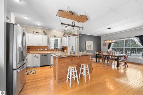 9763 Silny Rd, Interlochen, MI, 49643-9490 | Card Image