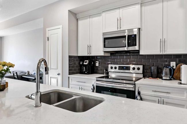 418 - 4150 Seton Dr Se, Condo with 1 bedrooms, 1 bathrooms and 1 parking in Calgary AB | Image 4
