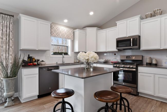 (Photo of decorated model, actual home's finishes will vary) This new two-story home showcases a modern design with a lower-level recreation room for versatility. | Image 7