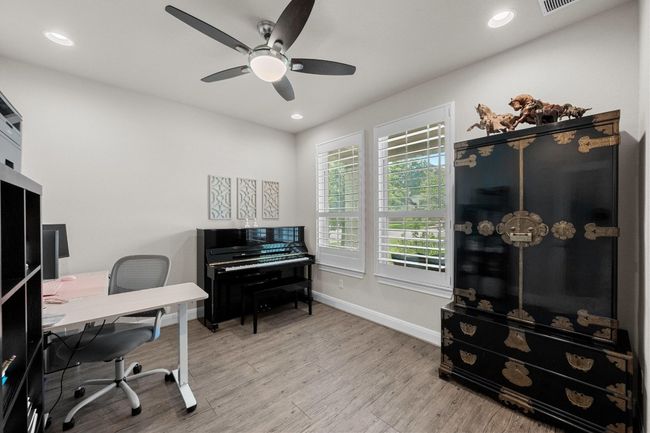 Private Office with a ceiling fan, wood finished floors, and recessed lighting | Image 19