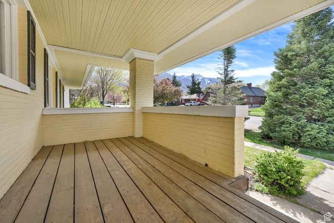 Wooden terrace featuring a mountain view | Image 30